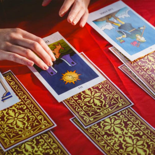 TAROT CARD READING. <br>
      The practice of using tarot cards to gain insight into the past, present or future by formulating a question, then drawing and interpreting cards. Reading tarot cards is a type of cartomancy. A regular tarot deck consists of 78 cards, which can be split into two groups, the major arcana and minor arcana..